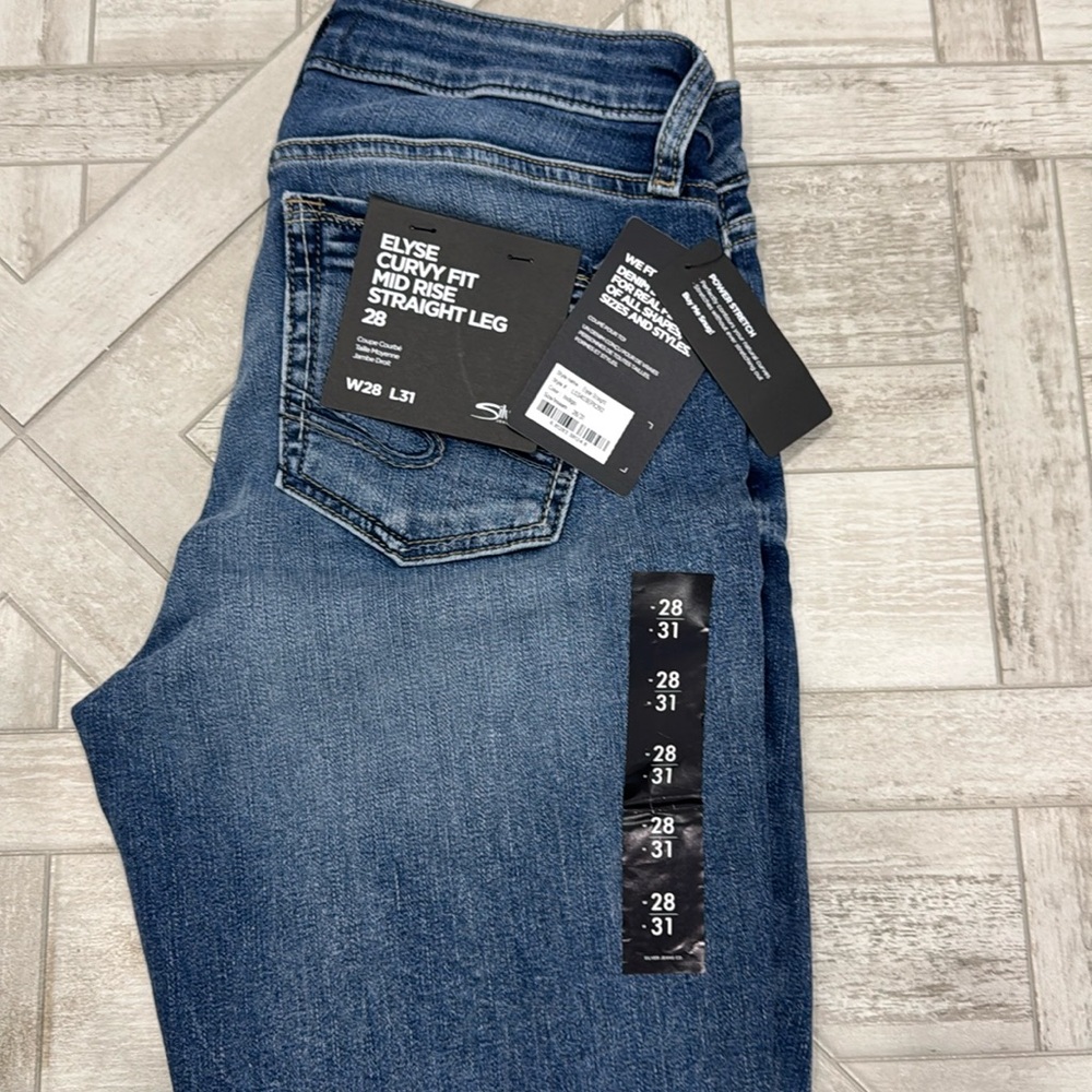 Silver Elyse. Brand new  28/31. Curvy fit. Mid rise.  Straight leg